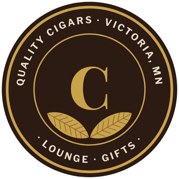 Churchill's crest: a gold C over crossed tobacco leaves