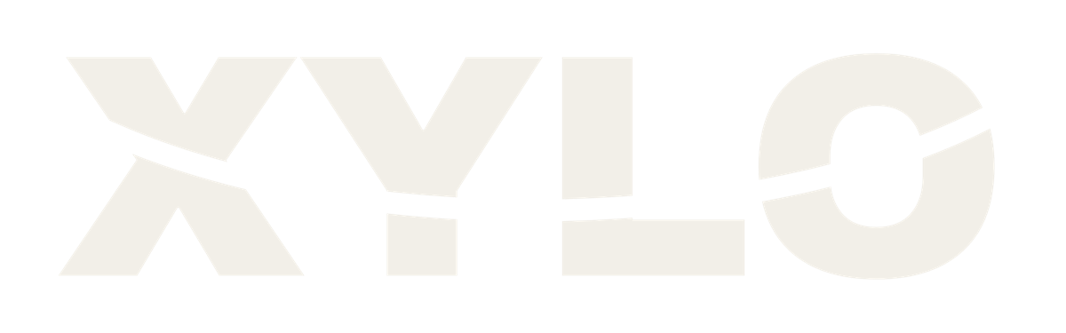 XYLO smile logo in warm white on Cool Mint blue