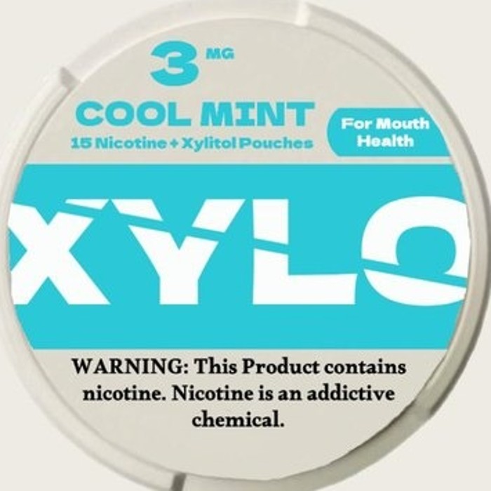 The original XYLO Cool Mint can: a straight slash through the wordmark and a small For Mouth Health badge